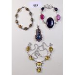 A silver citrine set necklace, a stone set pendant and two stone set bracelets