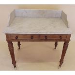 A Victorian satinwood washstand with galleried marble top
