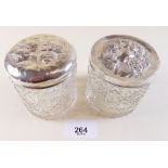 Two glass and silver dressing table jars, Birmingham 1903 and 1907