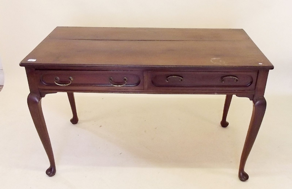 An early 20th century mahogany side table with two drawers