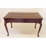 An early 20th century mahogany side table with two drawers