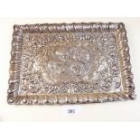 An Edwardian silver dressing table tray embossed cherub decoration, Birmingham 1911 - 175g