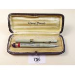 A Conway Stewart Duro Pont pencil and Dinkie ink pen, cased