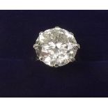 A large solitaire diamond ring - approx 5.5 carats - size i