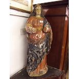 An 18th century large continental painted wooden sculpture of a Madonna 84cm high