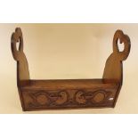 A Victorian oak Arts and Crafts book rack carved birds