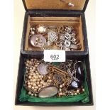A box of antique jewellery