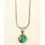 A 9 carat gold necklace with emerald and diamond set drop