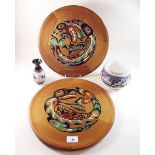 An Inuit pair of painted wooden plates plus an Innuit pottery vase and bowl - all signed