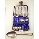 A set of six silver coffee spoons, cased - 73g, four silver coffee spoons, a napkin ring and a