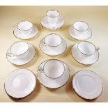 A Copeland and Garrett part tea service circa 1840 comprising six cups and saucers, one coffee cup