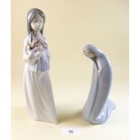 A Lladro figure of a nun and a Nao figure of girl with doll