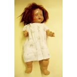 A mid 20th century G & S composition doll