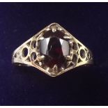 A 9 carat gold garnet set ring, size P