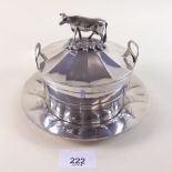 A silver plated butter dish and stand with cow finial