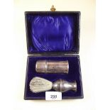An Edwardian silver gentleman's shaving brush and soap holder set by JHW, Birmingham 1910- cased