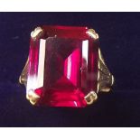 A 9 carat gold ring set red stone, size F