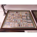 A framed set of Wills cigarette cards - framed and glazed