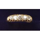 An 18 carat gold five stone diamond ring, size R