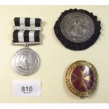 A St Johns Medal and two badges