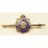 A 9 carat gold and enamel Royal Army Service Corps brooch - 4.5g