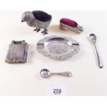 An 800 standard silver ashtray and various plated items including pin cushions, ashtray