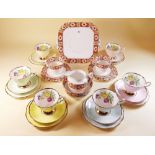 A Cavour Ware harlequin tea set comprising six cups and saucer and six tea plates and an Edwardian