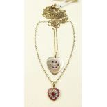 Two 9 carat gold ruby pendants and chains - total weight 6g