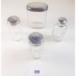 Four silver and glass dressing table jars, London 1886