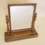 A Victorian satinwood swing toiletry mirror