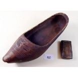 A carved wooden clog and an olive wood snuff box