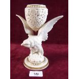 A Grainger's Worcester reticulated vase on eagle support 19cm