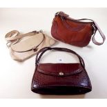 A Balenciaga leather handbag and two other handbags