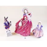 Two Royal Doulton figures Dinky Do and Autumn Breezes plus another figure 'The Trusty Servant'