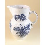 An 18th century Caughley blue and white 'mask' jug circa 1780 a/f