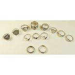 Twelve various silver rings