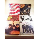 A group of records including The Beatles, The Spencer Davis Group, Manfred Man etc