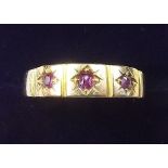 A Victorian 15 carat gold ring set three rubies - size O
