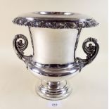 A 19th century Sheffield plated wine cooler with liner and scrollwork handles