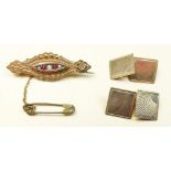 A pair of 9 carat gold cufflinks, 4g and a Victorian 9 carat gold brooch set seed pearls and red