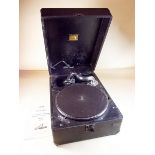 A His Masters Voice portable Gramophone model 102, with instructions