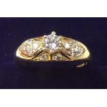 An 18 carat gold diamond set ring - size N