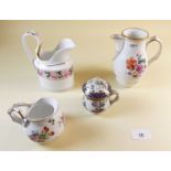 A collection of four 19th century hand painted jugs and pots