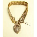 A 9 carat gold gate link bracelet with heart shape padlock, 14.8g