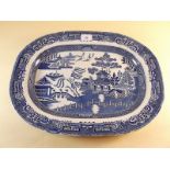 A stone china Staffordshire blue and white willow pattern meat plate