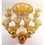 A Carnival glass punch bowl and eleven glasses