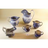 A selection of seven blue and white jugs including a set of three graduated Wedgwood 'Fallow Deer'