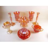 A group of Carnival glass items to include candlesticks, vases etc