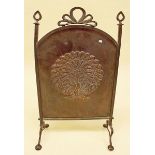 A metal firescreen with peacock decoration - a/f