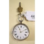 A silver ladies pocket watch with ornate floral decoration to back, with key - Charles Feis and Co